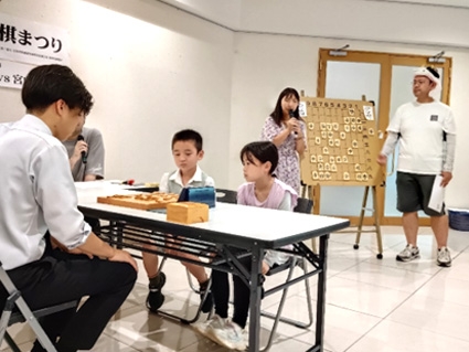 地元小学生代表者VS高橋四段による席上対局