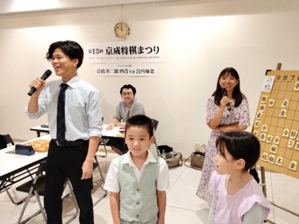 敗れた高橋四段、罰ゲームの歌唱ショー