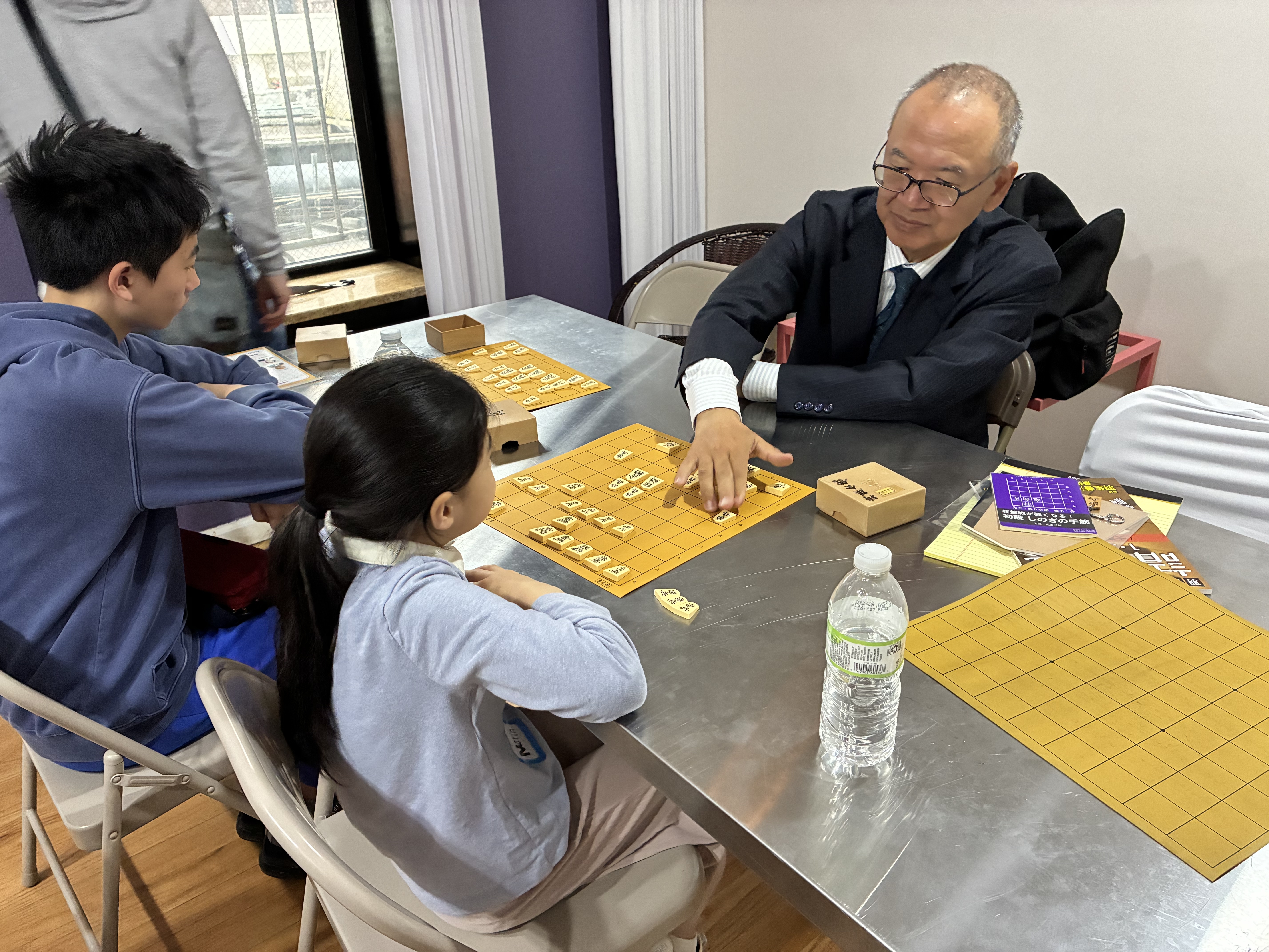 5.石川七段の指導対局の様子.jpg